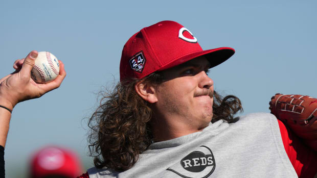 Cincinnati Reds non-roster invitee pitcher Rhett Lowder (81) long tosses during spring training workouts, Saturday, Feb. 17, 2024, at the team's spring training facility in Goodyear, Ariz.  